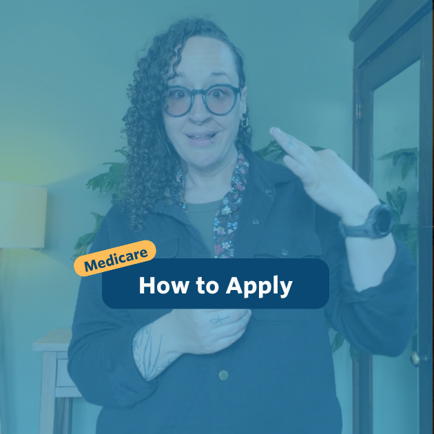 The post has a video thumbnail with blue shading overlaid. The top middle has "Medicare: How to Apply&rdquo; in white text with light blue background, accompanied by a yellow bubble with &ldquo;Medicare&rdquo; in blue. In the video: A nonbinary person with long, curly brown hair that is shaved on the right side of their head stands in front of the camera. Behind them is a light wooden entry table with a potted monstera plant set against a green wall. They are wearing black pants, a black jacket over a floral button-down shirt, and a pair of tinted glasses.
