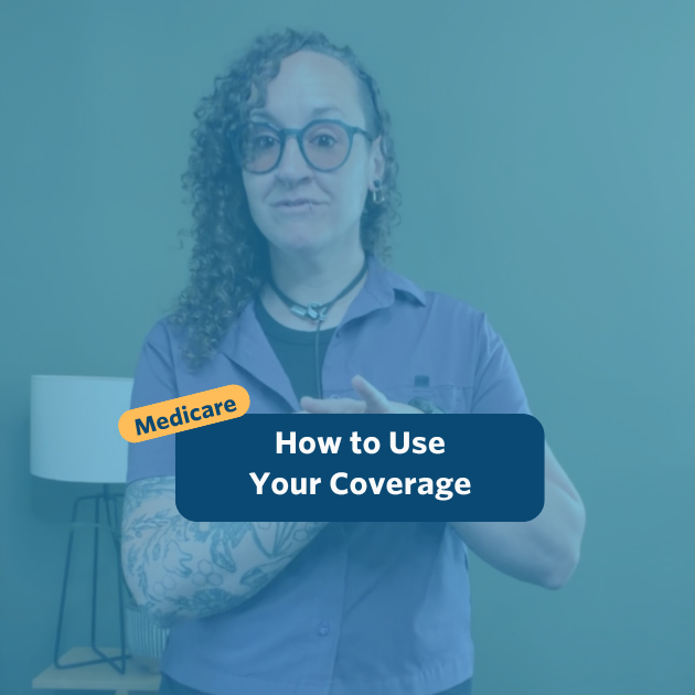 The post has a video thumbnail with blue shading overlaid. The top middle has "Medicare: How to Use Your Coverage&rdquo; in white text with light blue background, accompanied by a yellow bubble with &ldquo;Medicare&rdquo; in blue. In the video: A nonbinary person with long, curly brown hair that is shaved on the right side of their head stands in front of the camera. Behind them is a small light wooden table with a potted plant set against a green wall. They are wearing black pants, a purple button down shirt over a black top, and a pair of tinted glasses.